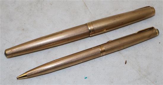 A Parker 9ct gold fountain pen and pencil set